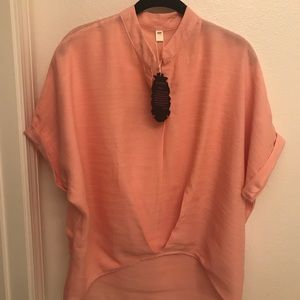 Pale tangerine high low top